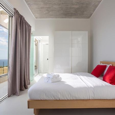 Kuro Beach House - Oceanfront Luxury & 25M Pool Achlia ภายนอก รูปภาพ