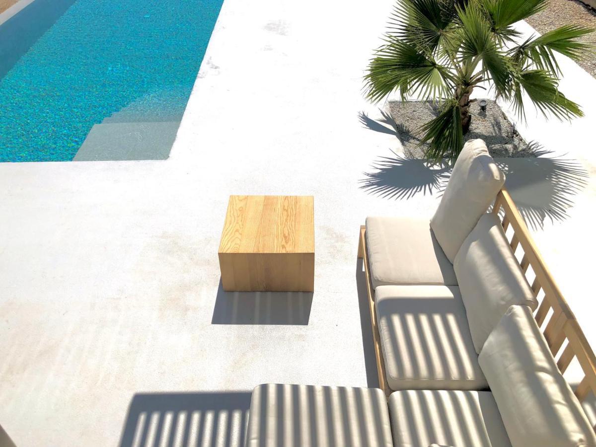 Kuro Beach House - Oceanfront Luxury & 25M Pool Achlia ภายนอก รูปภาพ